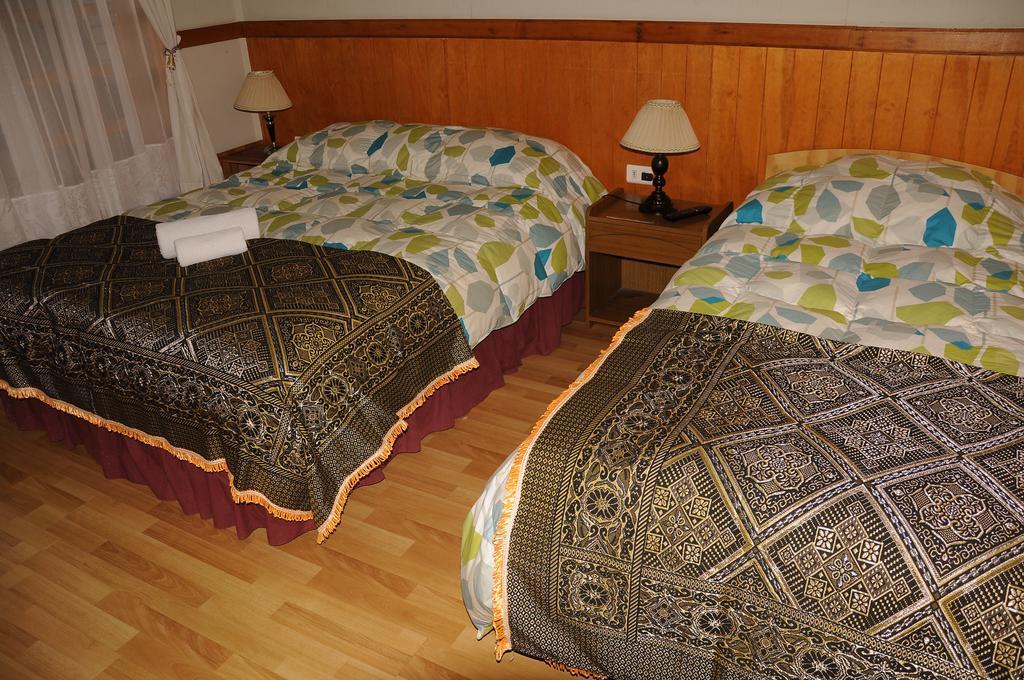 פורטו נטאלס Hostal El Rincon חדר תמונה